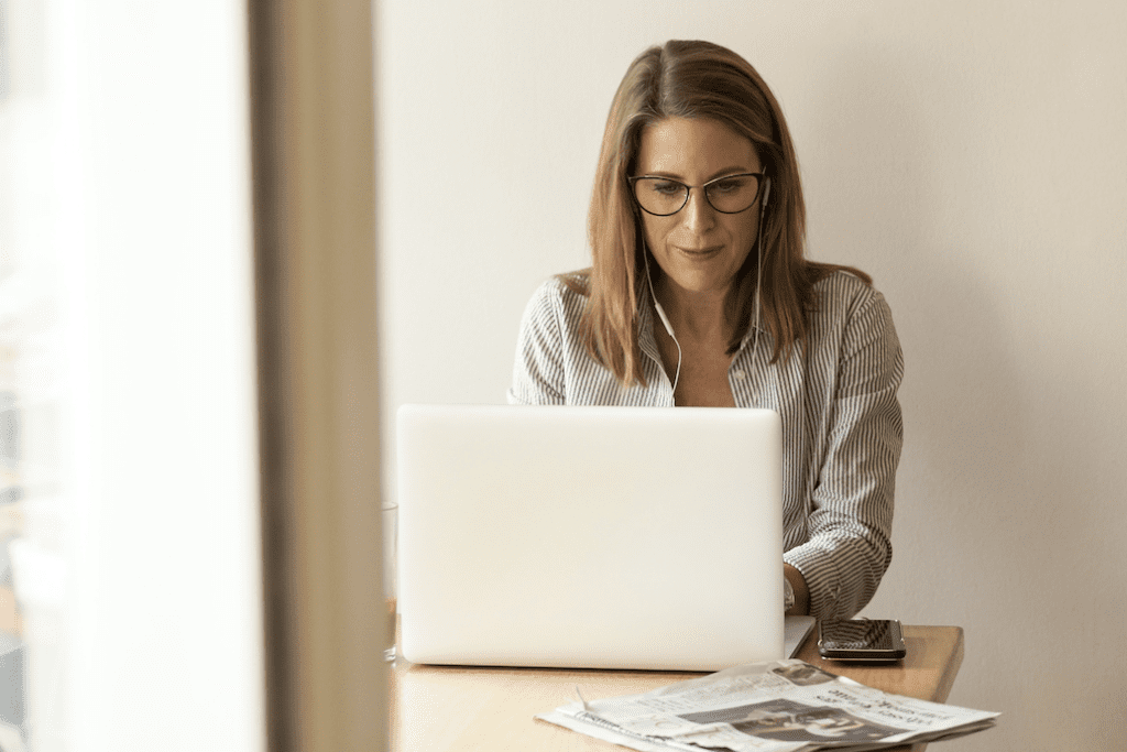 How Many Investment Funds - Woman At Laptop